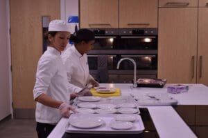 Two chefs in a kitchen