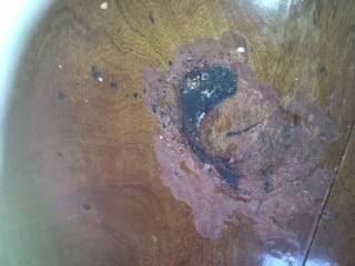 Burnt table but insurance company thought it could be repaired