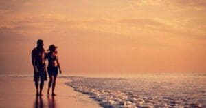 couple on beach sunset