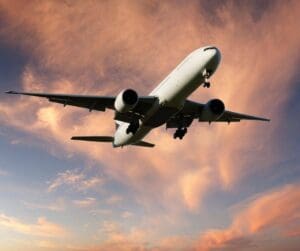 Aeroplane in sky with clouds
