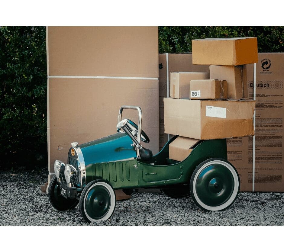old fashioned car with boxes on it