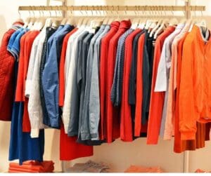 different shirts and colours on hanging rail