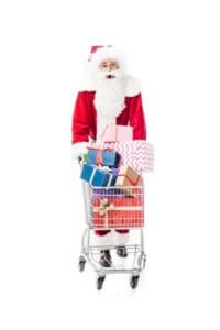 Graphic Santa pushing a trolley with presents