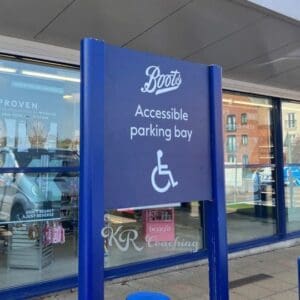 Boots the chemist sign for parking space stating “Less abled parking”