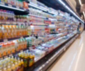 freezer aisle in supermarket left hand side ricks and other food blurred