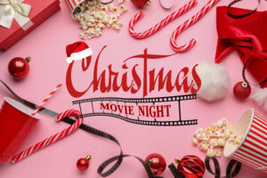 Banner with popcorn and Christmas decor on pink background. Christmas celebration